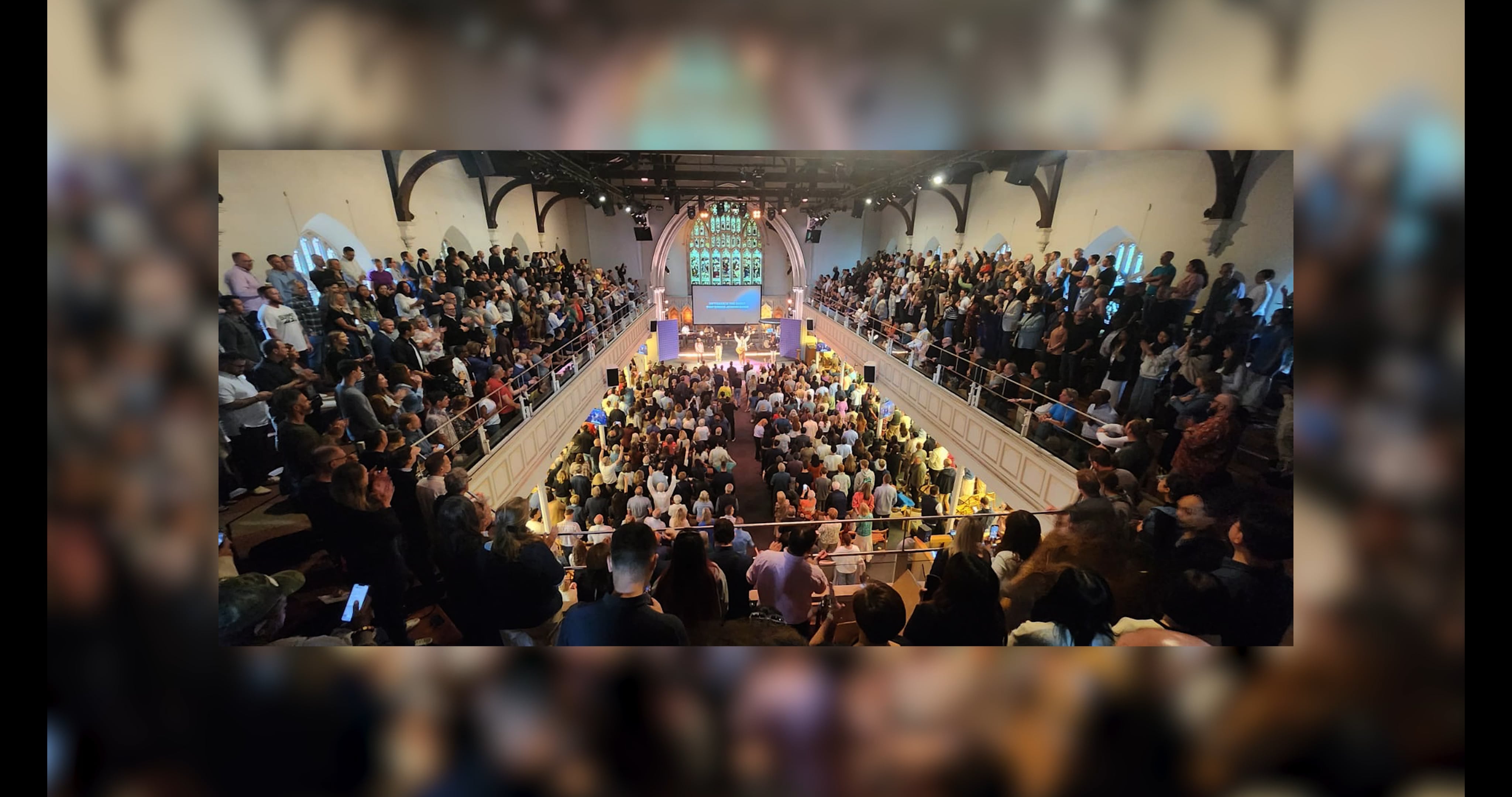 Young adults in a prayer meeting